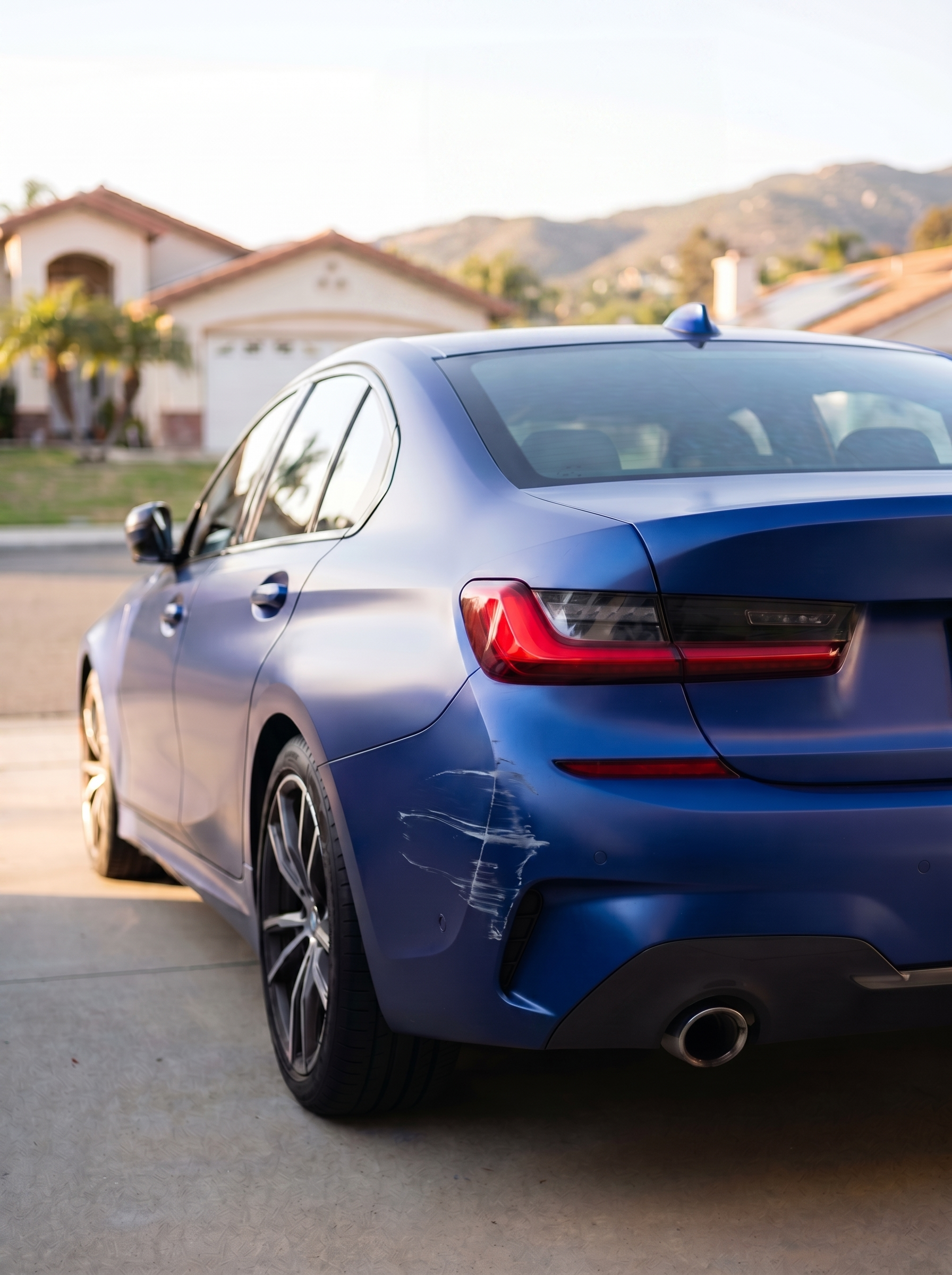 Before — BMW rear quarter damage